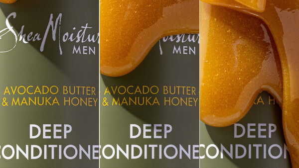 Three product bottles of Shea Moisture Men deep conditioner with avocado butter and manuka honey, shown from different angles with golden amber liquid visible.