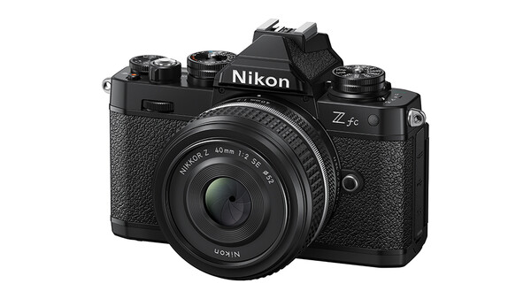 Nikon Z fc mirrorless camera with 40mm lens mounted, shown on white background.