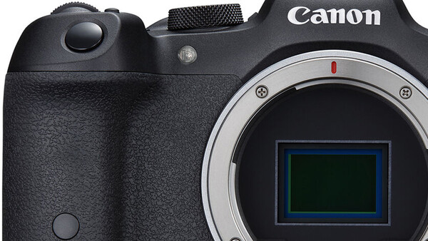 Canon mirrorless camera body with electronic viewfinder displayed front-on.