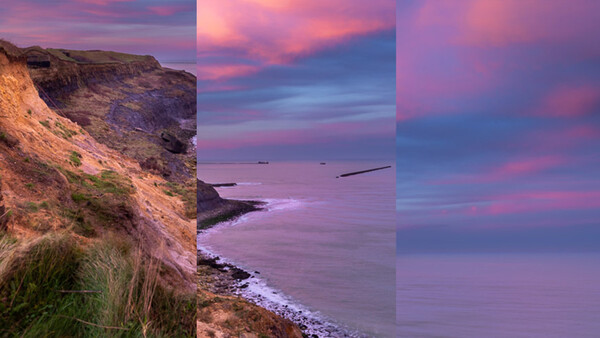 Coastal cliffs at sunset with purple and pink sky reflecting on calm water.