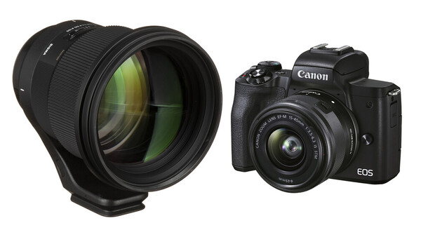 Canon EOS mirrorless camera with kit lens and detached telephoto lens against white background.
