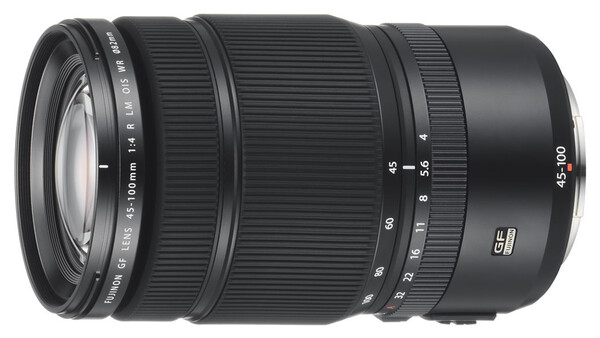 Telephoto zoom lens with extended barrel and focus ring against white background.