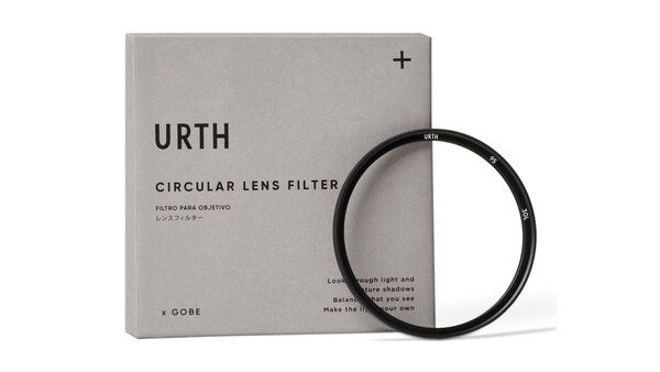 Urth Circular Lens Filter by x GORE next to its retail packaging on neutral background.