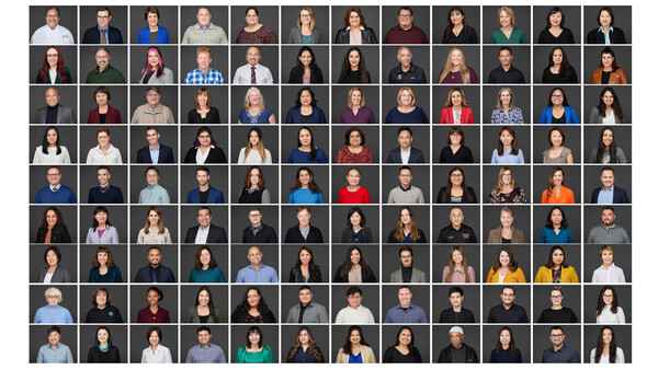 Grid of 91 professional headshot portraits arranged in 7 rows and 13 columns against dark backgrounds.