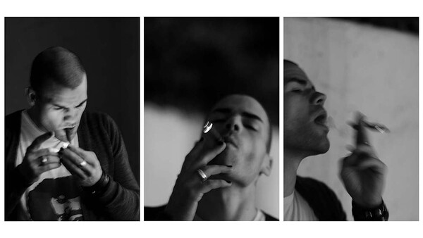 Three black and white portraits of men in contemplative poses with cigarettes.