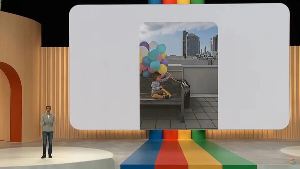 Illustration of a creative studio presentation displaying a rooftop photograph on a large screen.