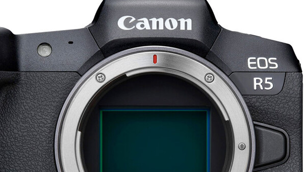 Canon EOS R5 mirrorless camera body front view showing lens mount and sensor.