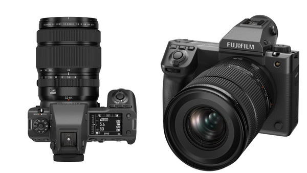 Two mirrorless cameras displayed from above: a compact model with telephoto lens on the left, and a larger body with wide-angle lens on the right.