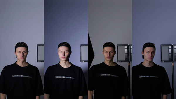 Four identical male portraits arranged in a row, with a black silhouette shape positioned between the second and third figures.