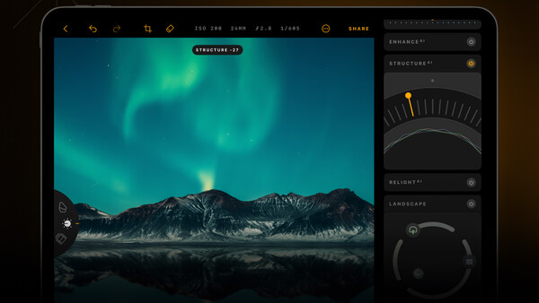 Screenshot of photo editing software showing aurora borealis over mountains with adjustment panels on right.