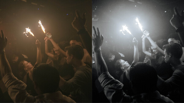 Side-by-side comparison showing warm and cool white balance renderings of a crowd with raised hands and sparklers at night.