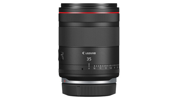 Canon RF 35mm f/1.8 macro lens with focus distance scale and distance markings visible on barrel.