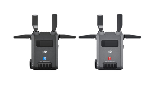 Two DJI wireless transmitter units shown front-facing with extended antenna arms.
