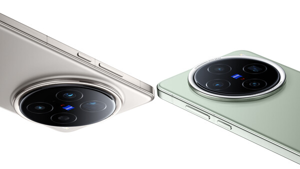 Close-up comparison of two smartphone camera systems with circular lens arrays and metallic rings.