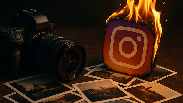 Professional camera beside burning Instagram logo icon with scattered film prints on dark surface.