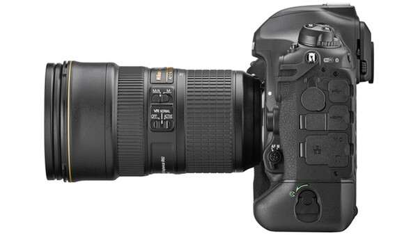 Professional DSLR camera with telephoto lens attached, shown in side profile view.