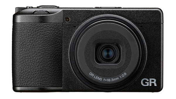 Ricoh GR compact digital camera with fixed 18.3mm lens, displayed from above against white background.