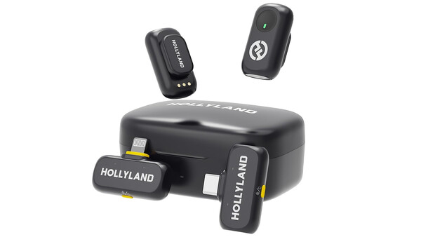 Hollyland wireless microphone system with compact receiver and two transmitter units displayed with charging case.