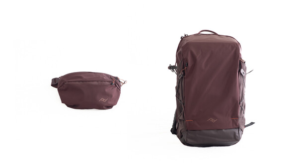 Two burgundy travel bags shown side by side—a compact waist pack on the left and a larger convertible backpack on the right.