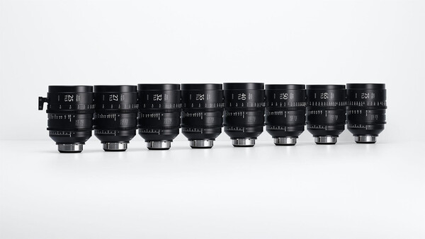 Eight cinema prime lenses arranged in a row, displaying focal lengths from 14mm to 85mm.