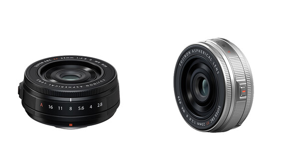 Two compact camera lenses displayed side by side against a white background.