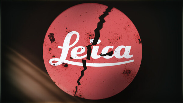 Graphic design featuring the Leica logo with a jagged crack running through a red circular background.