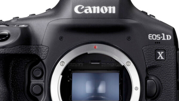 Canon EOS-1D X DSLR camera body shown from front with mirror open and sensor visible.