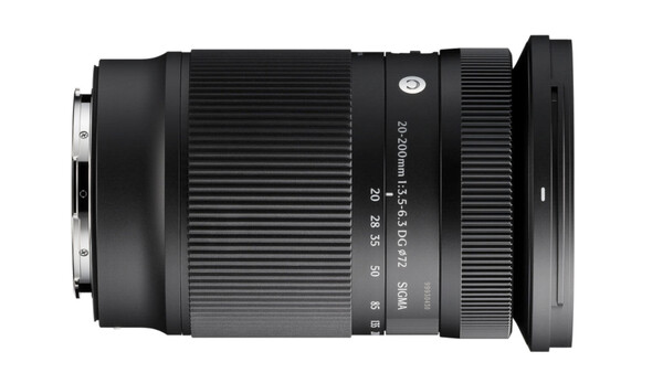 Sigma telephoto zoom lens with ribbed barrel and focus ring against white background.