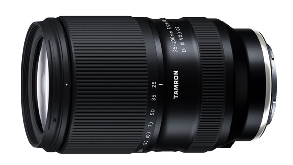 Tamron 28-200mm telephoto zoom lens with focus and aperture rings visible against white background.