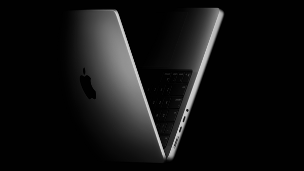 Sleek aluminum laptop shown in profile against black background, displaying open lid with keyboard visible.