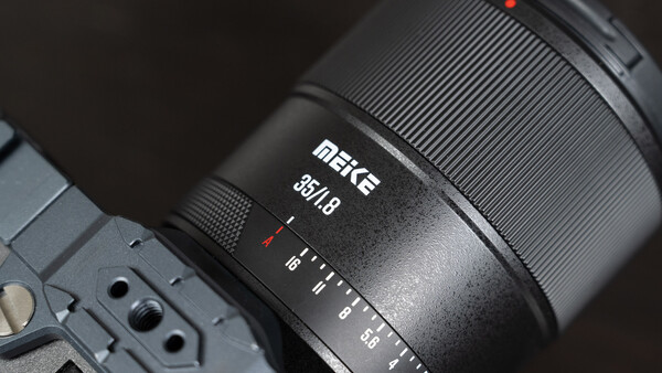 Meike 85mm f/1.8 lens mounted on a camera body, showing the lens barrel and focus ring in detail.