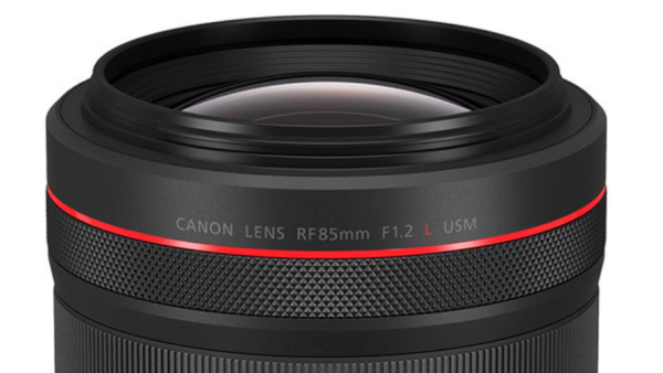 Canon RF 85mm F1.2L USM lens with red accent ring and textured grip band.