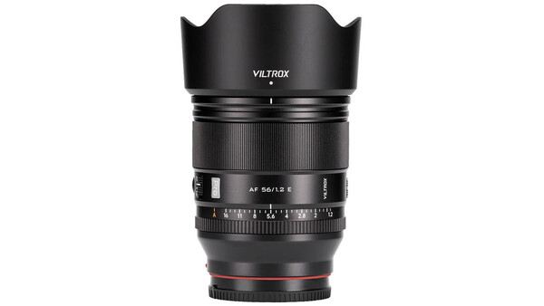 Viltrox AF 56/1.5 E prime lens with hood mounted and aperture ring visible against white background.