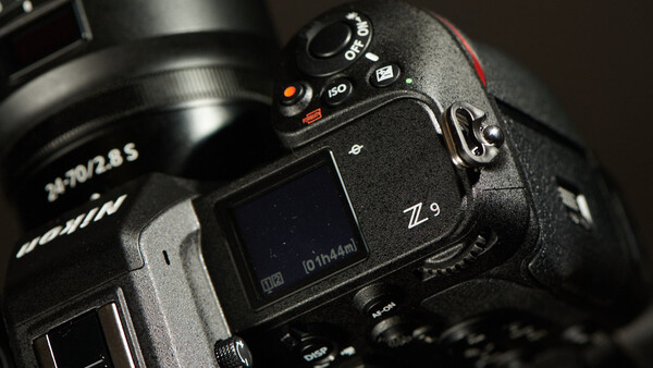 Nikon Z9 mirrorless camera body with attached lens shown in overhead detail shot.
