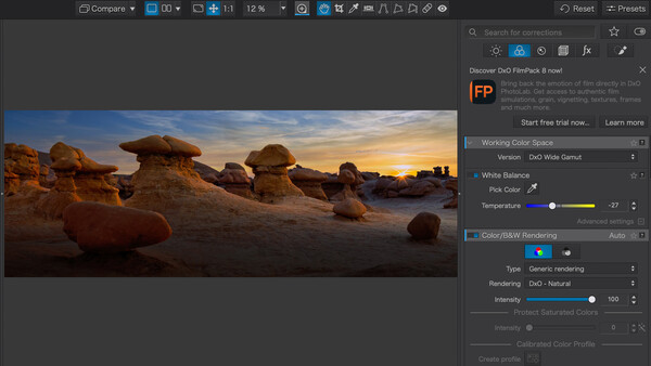 Screenshot of DxO photo editing software displaying a desert landscape at sunset