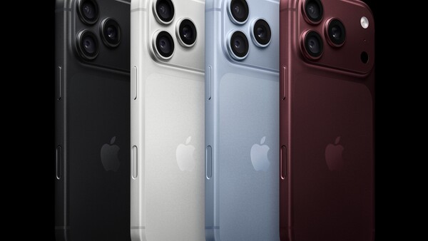 Four smartphone models displayed in black, white, light blue, and deep red finishes against a black background