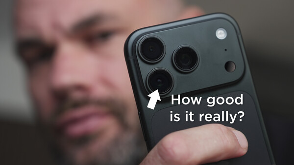 Close-up of smartphone rear camera module with triple lens setup and annotation asking 'How good is it really?'