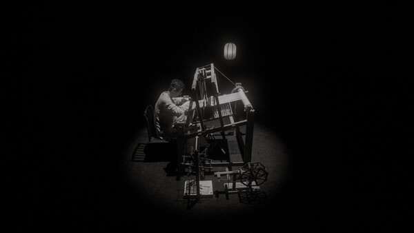 Cinematographer operating a film camera on a crane rig in dramatic studio lighting