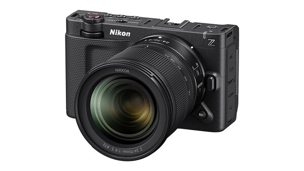 Nikon Z mirrorless camera with attached zoom lens on white background