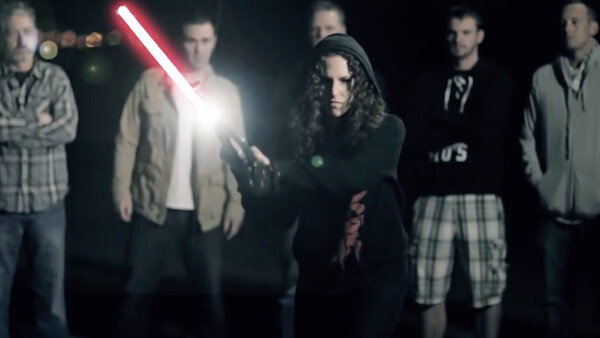 Lindsay Adler wields a lightsaber