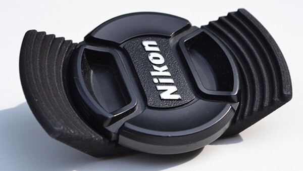 The Stow-Away Lens Cap Holder