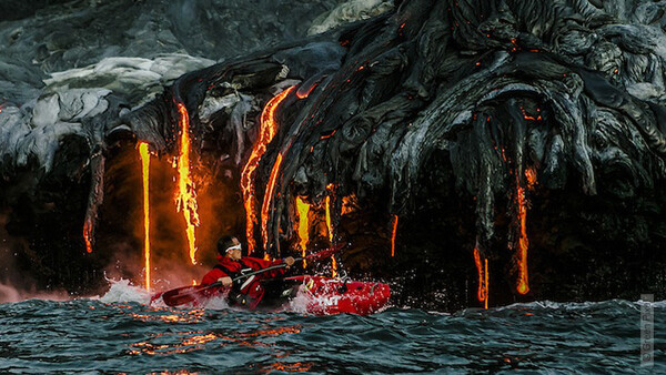Thrill Seeking Kayakers & A Photographer Chase Hot Lava