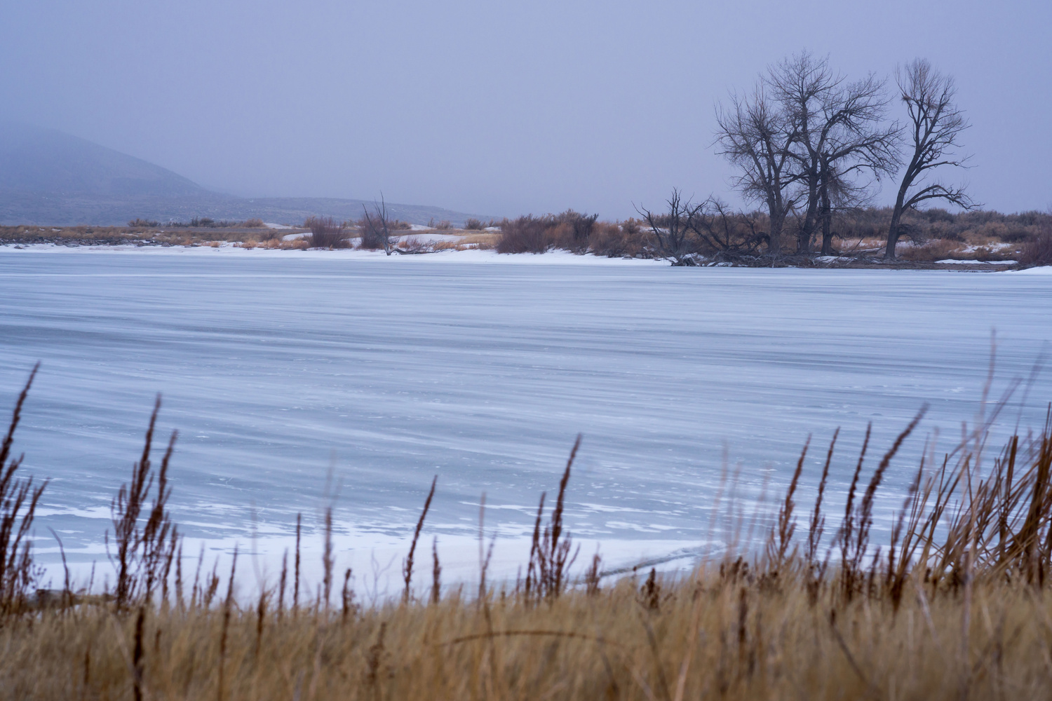 View Wyoming Windswept Lake by John Zimmerman