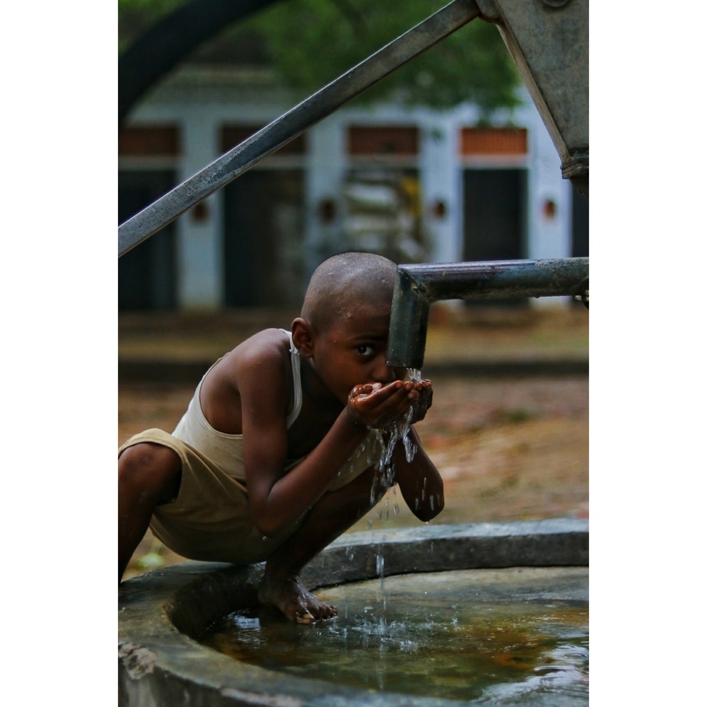 View A thirsty kid by Ashish Gautam