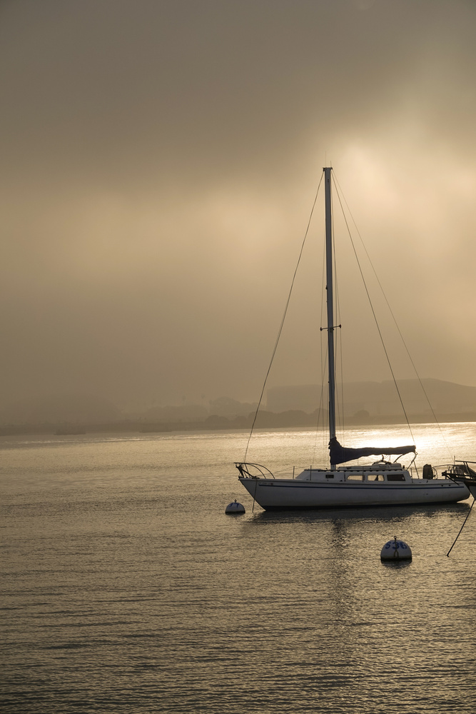 View Poking a hole through the clouds by Chris Christian