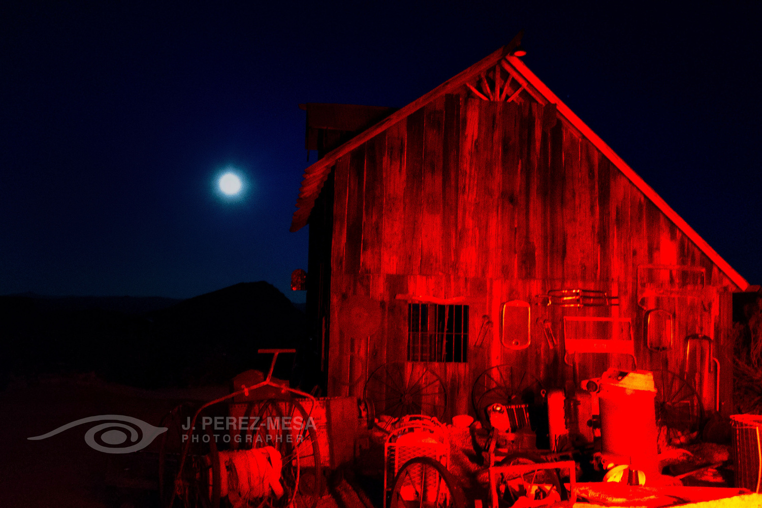 View Red Barn on an Almost Full Moon by Jose Perez-Mesa