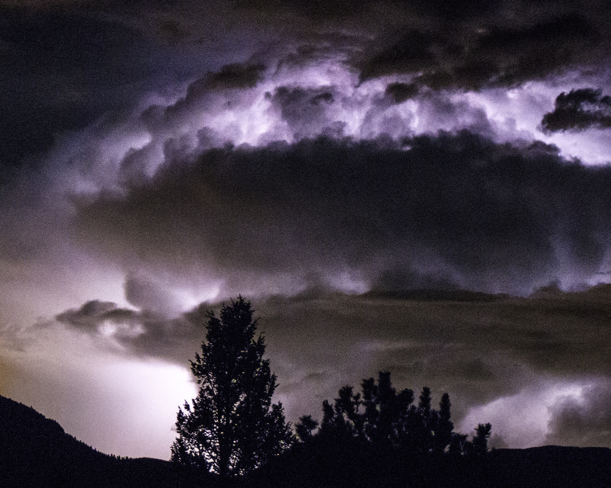 View Storm Over Denver by Ted Penberthy