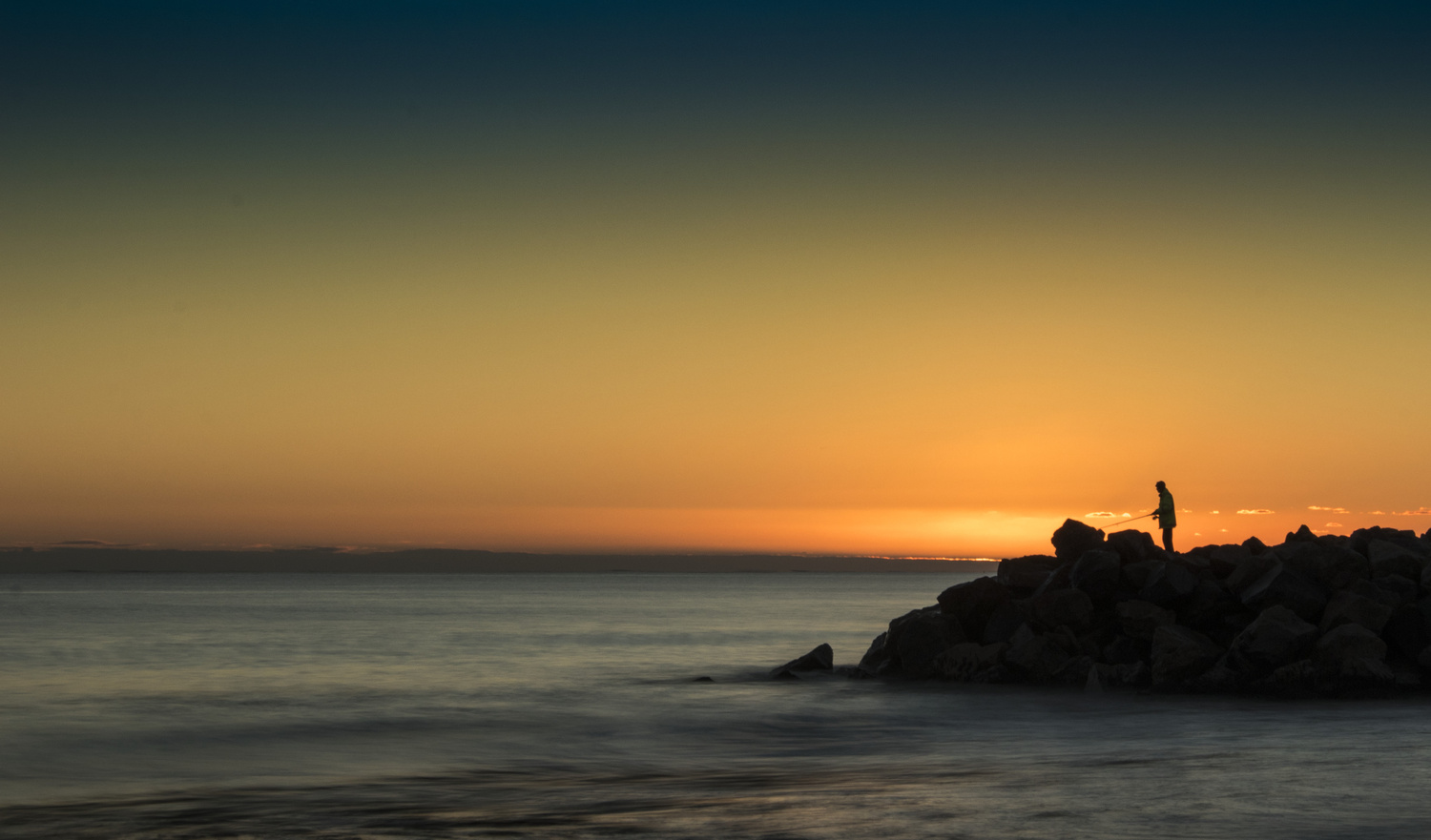 View Fishing at sunset by Paul Cooper