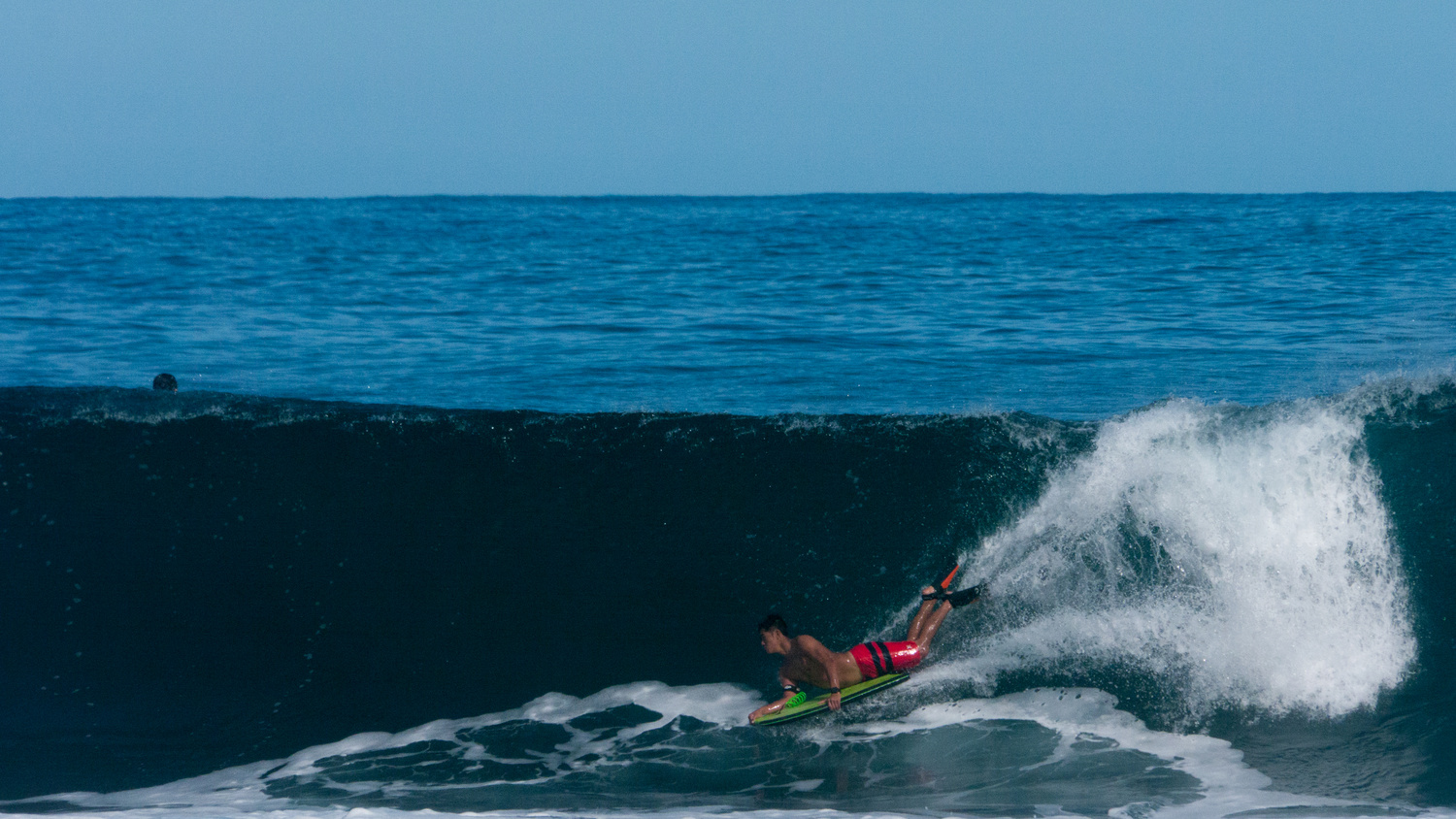 View Waipio body surfer by Rameses Mendoza
