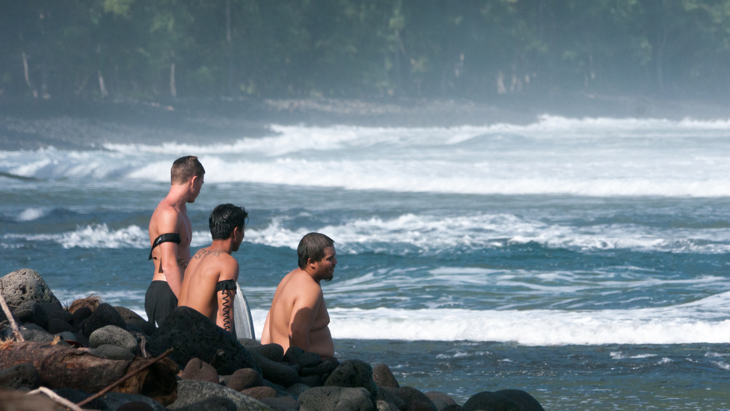 View Waipio surfers by Rameses Mendoza